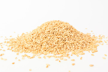 Sesame seeds on white background