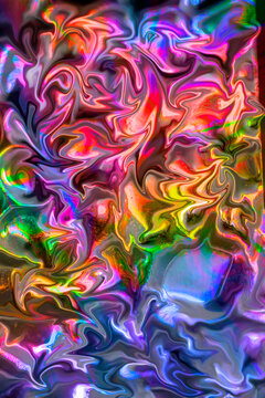 The abstract liquefying effect in the artistic background containing multicolored shapes with liquid texture, wavy lines, fluid art illustration