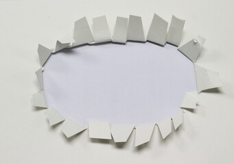 pieces of torn hole in paper texture background with copy space for text