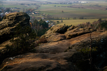 Aerial view from Drabske svetnicky, Autumn sandstone landscape of Bohemian Paradise in sunny day, winter at rock formation, Sandstone cliffs, colorful trees, nature National Park, Czech Republic