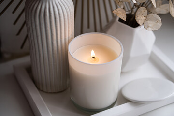 Luxurious white tray decoration, home interior decor with burning candle