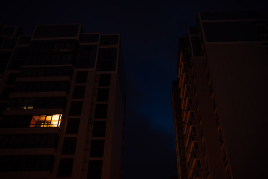 The Light Burns In One Window Of The Multitude In A Multi-storey Residential Building