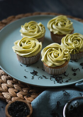 Cupcakes topped with green tea buttercream