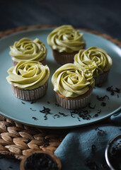 Cupcakes topped with green tea buttercream