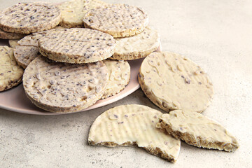 Puffed wheat cakes with sweet berries glaze. Round sweet wholegrain crispbreads, cereal crackers.