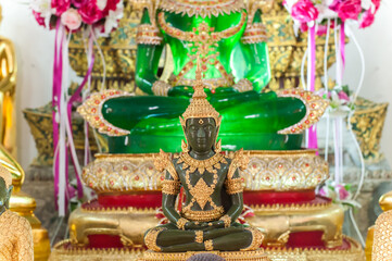 The Artificial Emerald Buddha image in summer costume at Wat Chimphli Sutthawat temple in Ko Kret Island , Nonthabubri temple , Thailand
