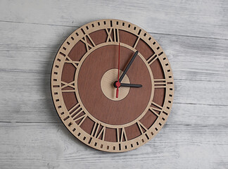 Wooden clock on a background