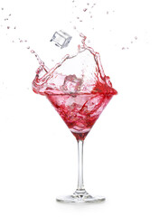 Ice cubes falling into a pink-red cocktail splashing out of a martini cup. Cosmopolitan glass...