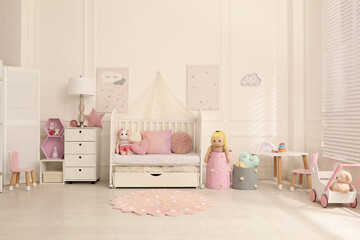 Cozy baby room interior with crib and toys - Powered by Adobe