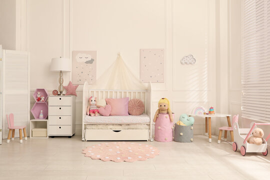 Cozy Baby Room Interior With Crib And Toys