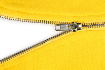 Yellow sweatshirt with zipper as background, top view © New Africa