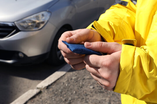 Man Holding Hand Warmer On Street, Closeup