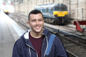 Young guy in train station 