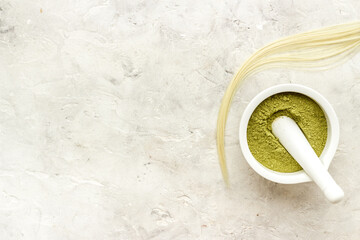 Herbal henna or mehandi powder for hair coloring or tattoo on hands