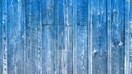 Old background of blue wooden planks board texture.