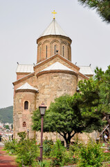 Fototapeta na wymiar Ancient Metekhi church in center of Tbilisi, Georgia
