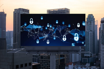 Padlock icon hologram on road billboard over panorama city view of Bangkok at sunset to protect business, Southeast Asia. The concept of information security shields.