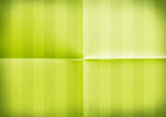 Green folded horizontal striped paper.