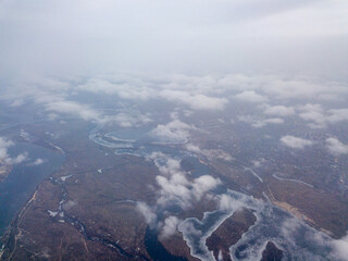 Aerial high view. Flight over the clouds of Kiev.