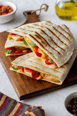 Quesadilla with chicken, tomatoes, corn, cheese and chilli. Mexican food. Fast food.