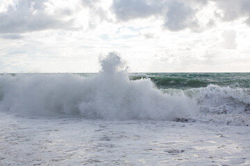 High spray from a wave on the sea
