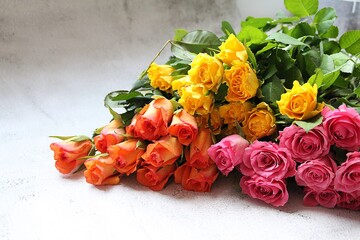 colorful roses, yellow, orange and pink cut flowers, a bouquet of colorful roses, fragrant flowers