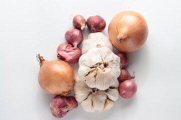 top view of onion, garlic, shallot isolated on white background. selective focus.