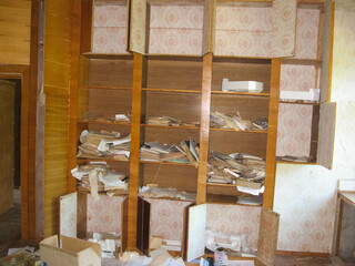 Old paper archives of abandoned power plant. old unnecessary pap