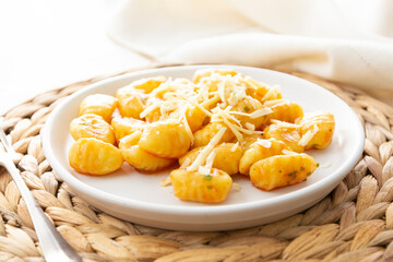 Gnocchi with cheese mediterranian food. Cooked gnocchi with butter and green onions.