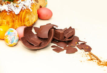 broken chocolate easter egg on white background