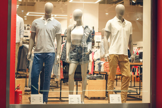 POLAND, BYDGOSZCZ - May 20, 2020: Male and female mannequins in a shop window in a casual style. Fashion industry
