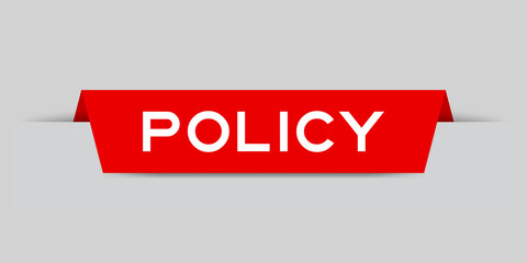 Red color inserted label with word policy on gray background