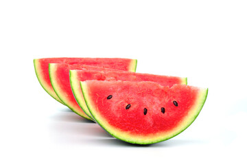 Watermelon cut into pieces The red meat has a sweet and juicy taste. Put on a white background
