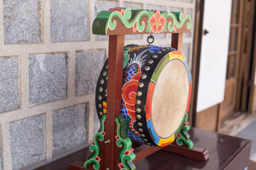 Naklejka premium Korean traditional drum called buk, with Taegeuk symbol.
