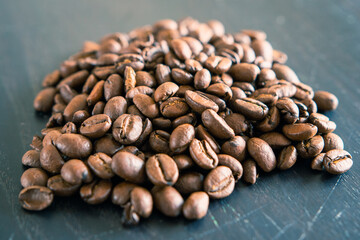 Coffee beans on wooden support