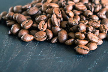 Coffee beans on wooden support