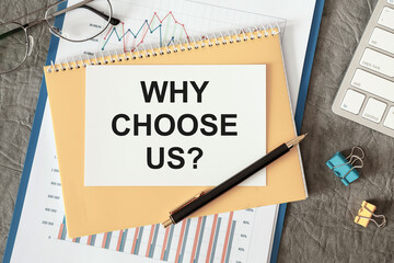 Why Choose Us is written in a document on the office desk