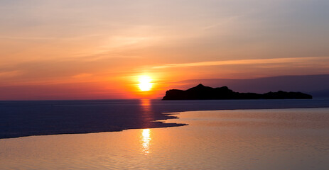 Sunrise over the lake Baikal. Early morning landscape.