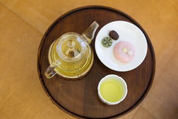 flower tea in glass teapot in traditional cafe in Seoul.