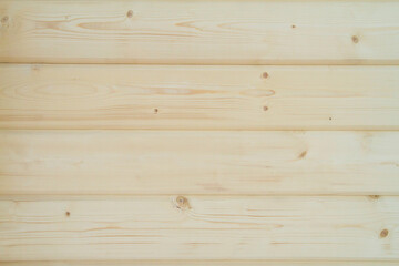 Building a house from a wooden beams.  wall of wooden  glued beams. Eco House construction. Pine beams. Timber. Wooden background.