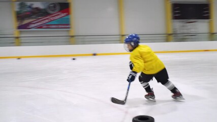 Russia, Children hockey training. Junior ice hockey team - Powered by Adobe