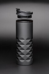 Black matte thermo cup on a black background