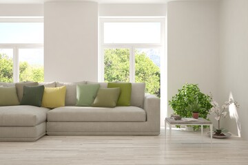 Minimalist living room in white color with sofa and summer landscape in window. Scandinavian interior design. 3D illustration