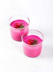 Jelly beet cranberry in a glass on a white background