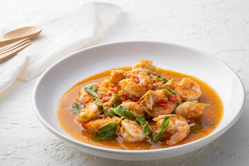 Stir fried shrimp with basil on white plate,thai spicy food