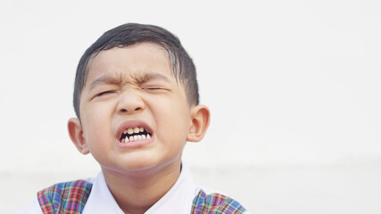 The Emotional Tantrum and Angry little Asian boy toddler complaining. Attention deficit hyperactivity disorder (ADHD) Concept.