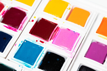 Colourful Watercolour Pallet of Messy Used Half Pan Paints