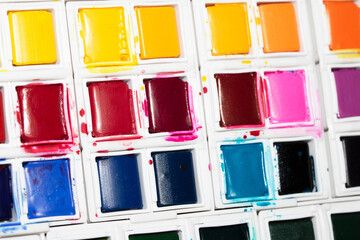 Colourful Watercolour Pallet of Messy Used Half Pan Paints