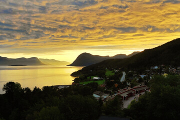 Beautiful fjord in Norway at sunset. View of the mountains in Molde, Norway