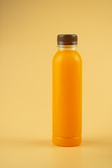Fresh orange juice in plastic bottle. Concept of beverage healthy